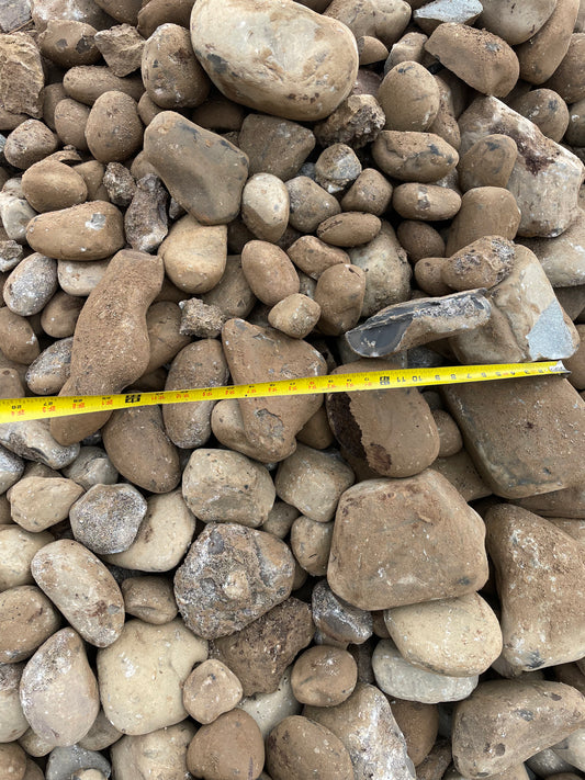 4" to 5" River rock by the ton $110.00. Free delivery within 10 miles. call for details. Multi ton discount. 315-725-5825